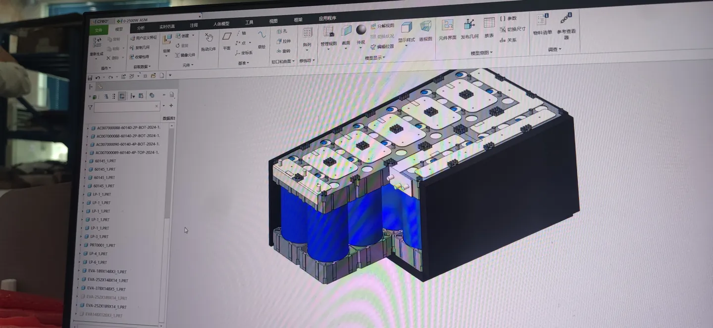Battery pack 3D layout shown on a design workstation photographed by the CY ENERGY team